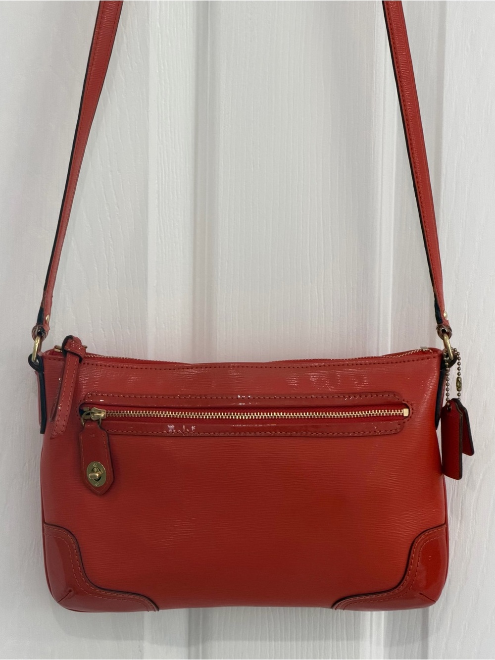 Coach Red orange pebble Leather Crossbody Bag with Gold Hardware